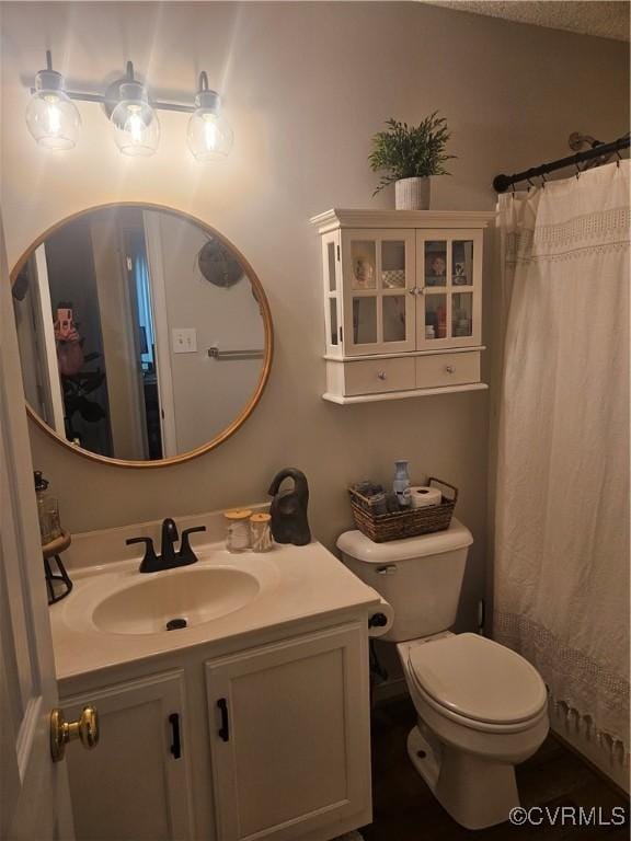 6778 Sassafras Dr, Quinton, VA 23141 - bathroom featuring vanity, toilet, and a shower with curtain