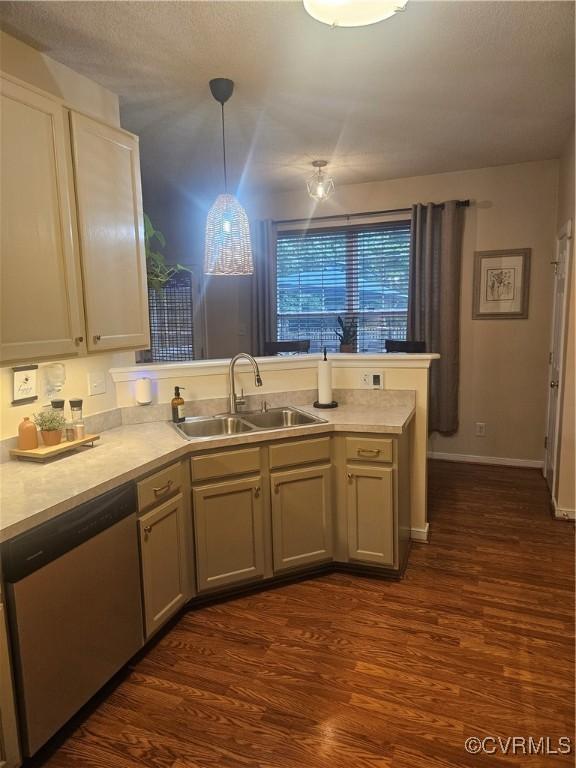 6778 Sassafras Dr, Quinton, VA 23141 - kitchen featuring dishwasher, a sink, a peninsula, and dark wood-style floors