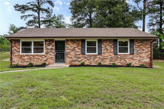 2222 Binford Ln, Richmond, VA 23223 - ranch-style house featuring a front yard and brick siding