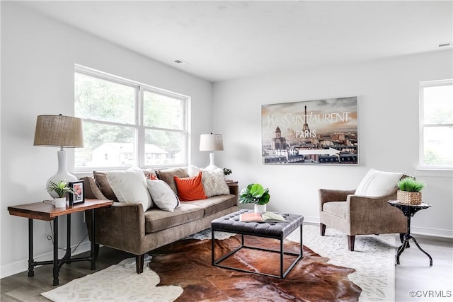 2222 Binford Ln, Richmond, VA 23223 - living area featuring wood finished floors and baseboards