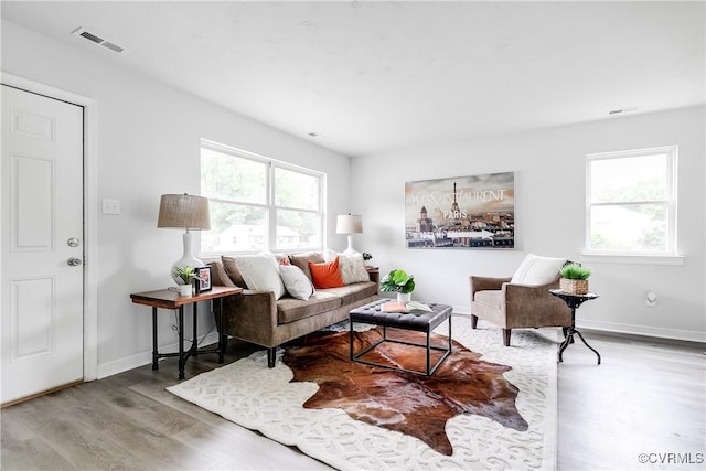 2222 Binford Ln, Richmond, VA 23223 - living area featuring wood finished floors and baseboards