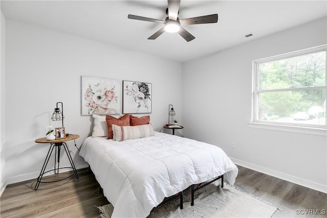 2222 Binford Ln, Richmond, VA 23223 - bedroom featuring wood finished floors, baseboards, and ceiling fan
