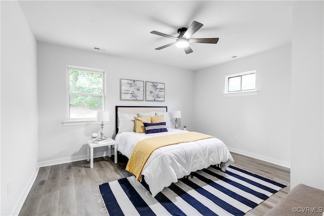 2222 Binford Ln, Richmond, VA 23223 - bedroom featuring wood finished floors, baseboards, and ceiling fan