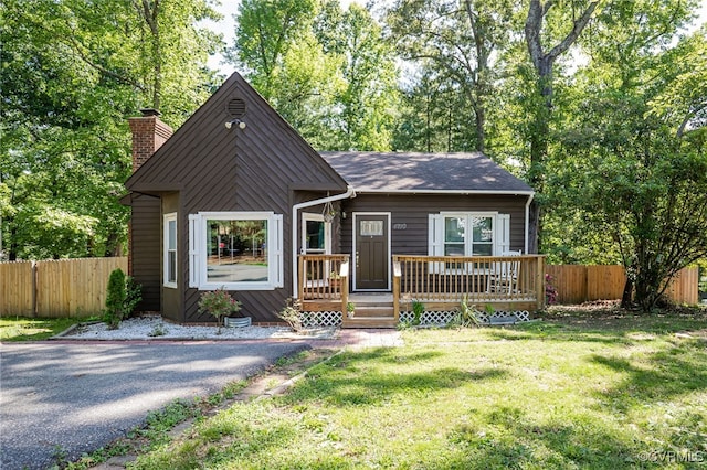 4710 Mason Rest Ct, Chesterfield, VA 23234 - view of front facade featuring a chimney, a deck, and roof with shingles