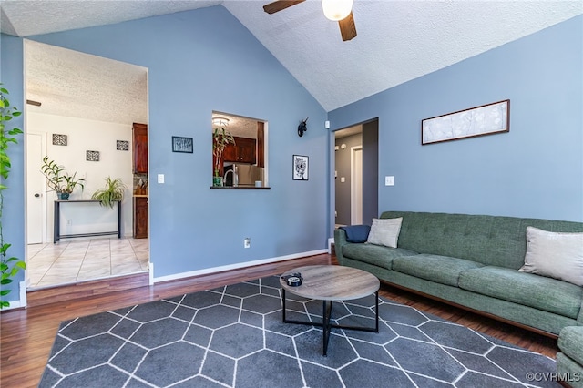 4710 Mason Rest Ct, Chesterfield, VA 23234 - living area with wood finished floors, a textured ceiling, ceiling fan, vaulted ceiling, and baseboards