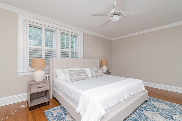 2923 Monument Ave Unit 1, Richmond, VA 23221 - bedroom with wood finished floors, ornamental molding, baseboards, and a ceiling fan