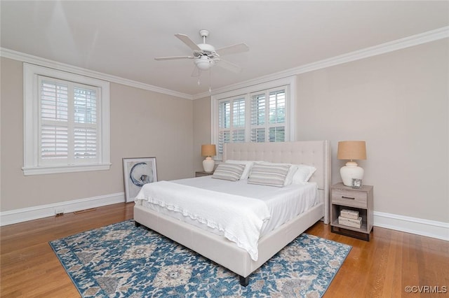 2923 Monument Ave Unit 1, Richmond, VA 23221 - bedroom featuring crown molding, baseboards, wood finished floors, and ceiling fan