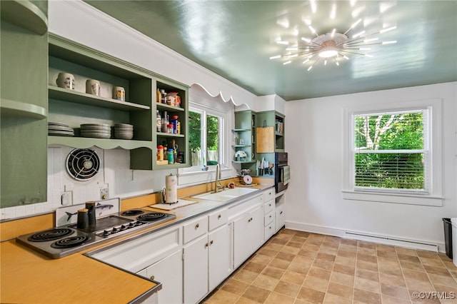 1743 Johnson Rd, Petersburg, VA 23805 - kitchen with a sink, open shelves, oven, stainless steel electric stovetop, and a baseboard radiator