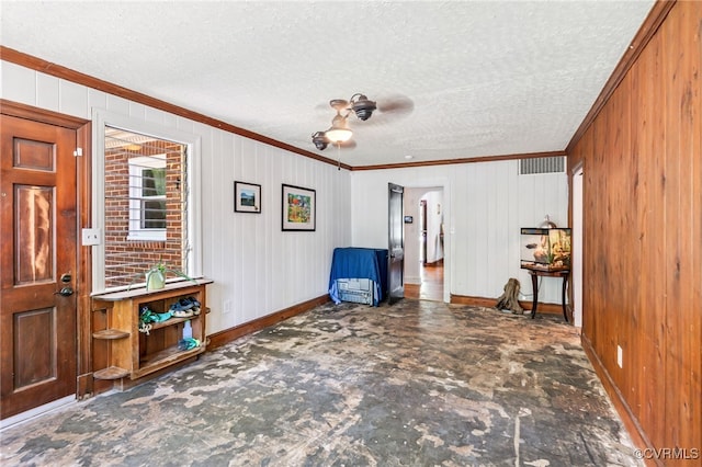 1743 Johnson Rd, Petersburg, VA 23805 - sitting room featuring baseboards, crown molding, ceiling fan, stone finish flooring, and a textured ceiling