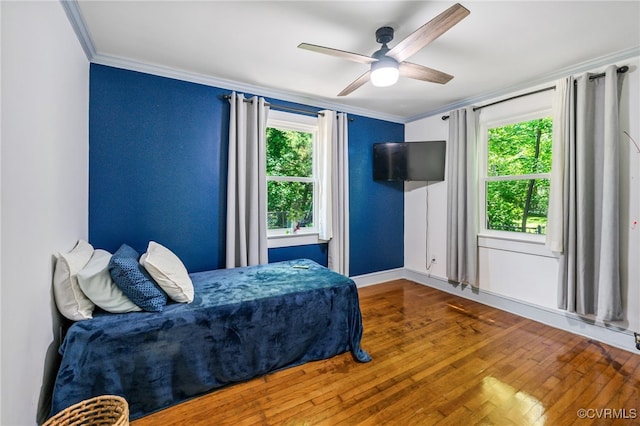 1743 Johnson Rd, Petersburg, VA 23805 - bedroom featuring ornamental molding, wood finished floors, a ceiling fan, and baseboards