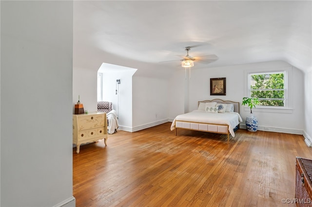 1743 Johnson Rd, Petersburg, VA 23805 - bedroom featuring light wood-type flooring, lofted ceiling, a ceiling fan, and baseboards