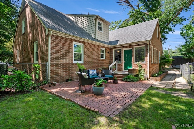 1743 Johnson Rd, Petersburg, VA 23805 - back of property featuring brick siding, a patio, and a shingled roof