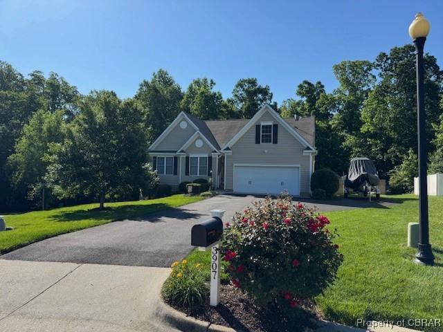 3907 Currier Ct, Chester, VA 23831 - traditional-style house with driveway and a front lawn