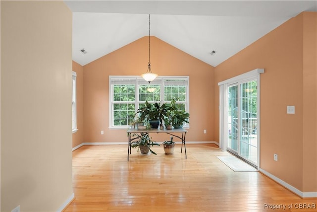 3907 Currier Ct, Chester, VA 23831 - dining area featuring plenty of natural light, light wood finished floors, lofted ceiling, and baseboards