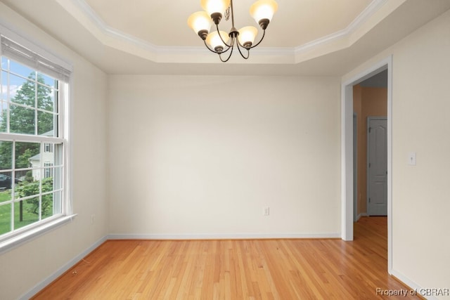 3907 Currier Ct, Chester, VA 23831 - unfurnished room with healthy amount of natural light, a chandelier, a tray ceiling, and crown molding
