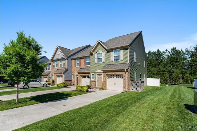 8910 Ringview Dr, Mechanicsville, VA 23116 - view of front of home with driveway, a garage, brick siding, and a front lawn