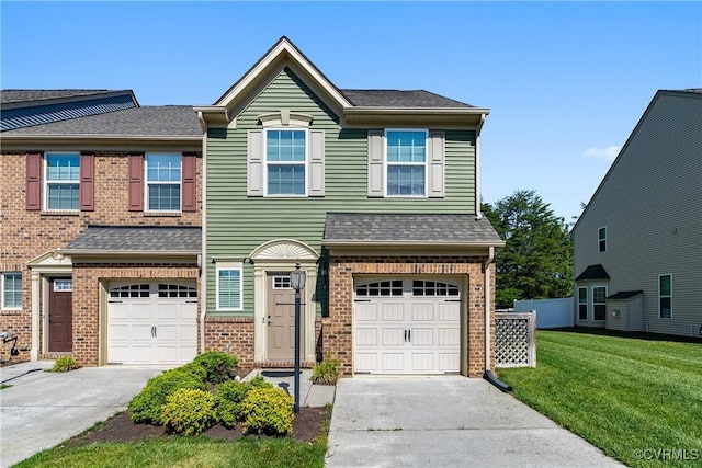 8910 Ringview Dr, Mechanicsville, VA 23116 - view of front of home with brick siding, driveway, a garage, and a front yard