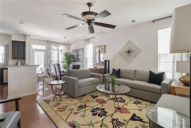 8910 Ringview Dr, Mechanicsville, VA 23116 - living area with light wood-style floors, a ceiling fan, and baseboards