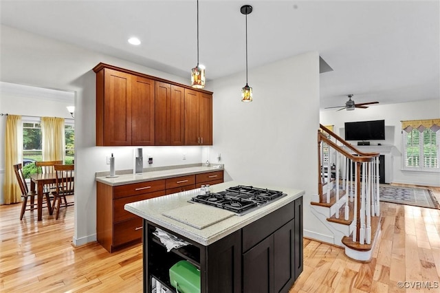 15836 Hampton Park Cir, Chesterfield, VA 23832 - kitchen featuring stainless steel gas cooktop, light countertops, light wood-style flooring, and recessed lighting