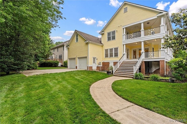 15836 Hampton Park Cir, Chesterfield, VA 23832 - rear view of house with stairway, a balcony, a lawn, a garage, and concrete driveway