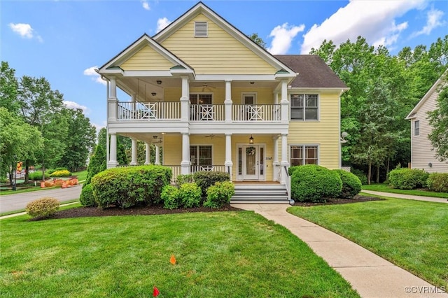 15836 Hampton Park Cir, Chesterfield, VA 23832 - greek revival house with a balcony, a porch, a front lawn, and a ceiling fan