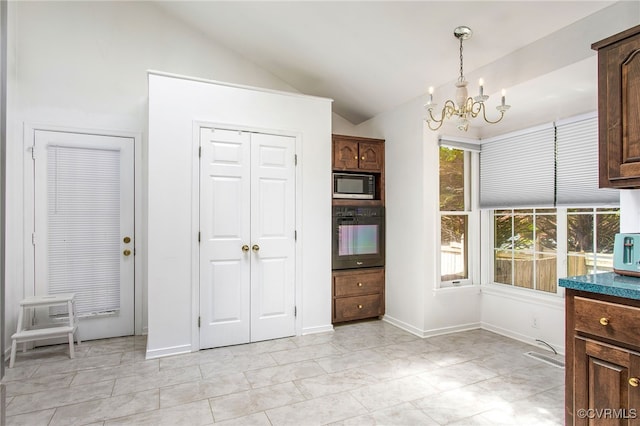 1724 Villageway Dr, Henrico, VA 23229 - unfurnished dining area featuring vaulted ceiling, a chandelier, and baseboards