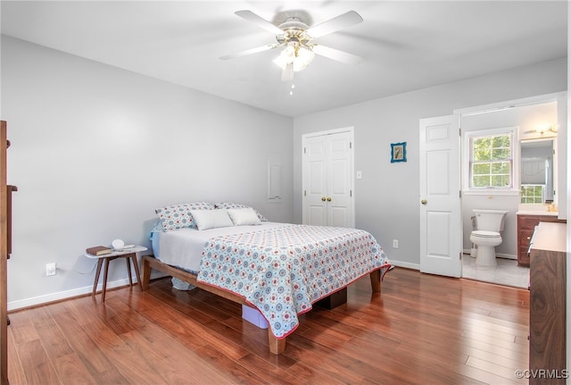 1724 Villageway Dr, Henrico, VA 23229 - bedroom featuring wood finished floors, baseboards, ceiling fan, and ensuite bathroom