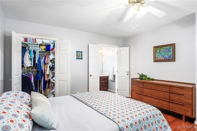 1724 Villageway Dr, Henrico, VA 23229 - bedroom with wood finished floors, a closet, a ceiling fan, and a spacious closet