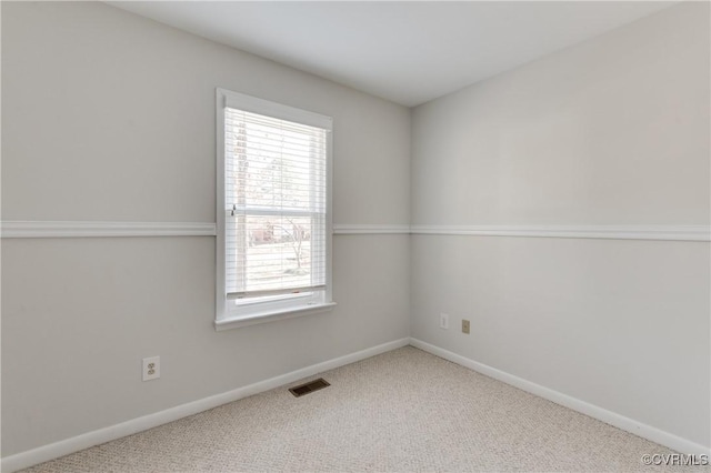 7611 Comanche Dr, Richmond, VA 23225 - spare room with plenty of natural light, carpet, and baseboards