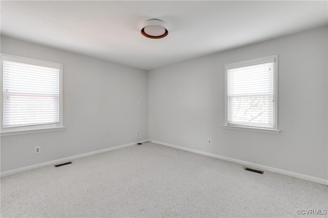 7611 Comanche Dr, Richmond, VA 23225 - spare room featuring carpet floors and baseboards