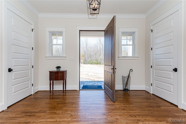 1555 Smokey Ridge Rd, Maidens, VA 23102 - foyer featuring crown molding, wood finished floors, and baseboards