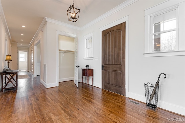 1555 Smokey Ridge Rd, Maidens, VA 23102 - foyer entrance featuring baseboards, crown molding, and wood finished floors