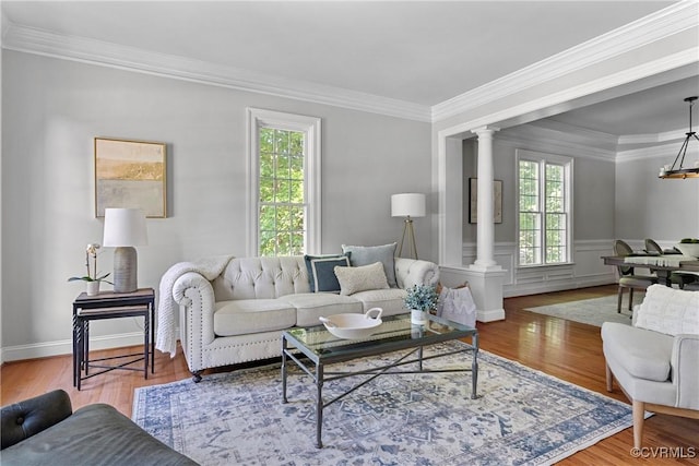 14136 Rigney Dr, Midlothian, VA 23113 - living room featuring ornate columns, ornamental molding, and wood finished floors