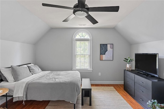 14136 Rigney Dr, Midlothian, VA 23113 - bedroom featuring light wood-style floors, lofted ceiling, baseboards, and ceiling fan
