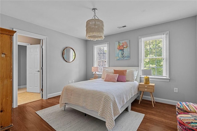 14136 Rigney Dr, Midlothian, VA 23113 - bedroom featuring baseboards and wood finished floors