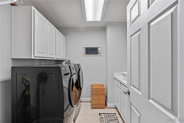 14136 Rigney Dr, Midlothian, VA 23113 - washroom featuring separate washer and dryer, cabinet space, baseboards, and light tile patterned floors