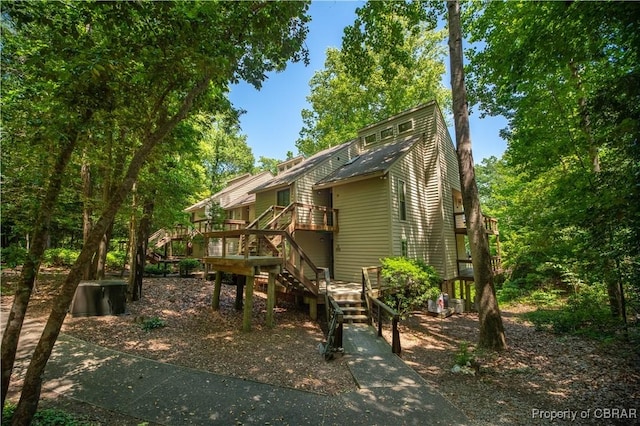 54 Villa Ridge Dr Unit C, Hartfield, VA 23071 - rear view of property with stairway and a deck