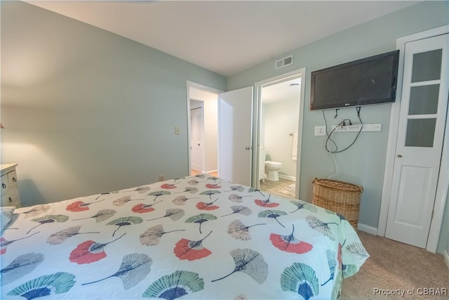 54 Villa Ridge Dr Unit C, Hartfield, VA 23071 - bedroom featuring carpet flooring, connected bathroom, and baseboards