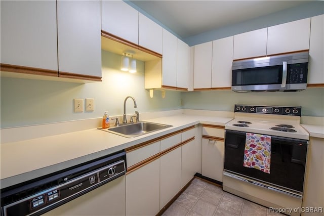54 Villa Ridge Dr Unit C, Hartfield, VA 23071 - kitchen featuring stainless steel microwave, range with electric stovetop, dishwasher, a sink, and light countertops