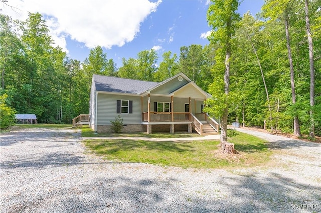 6180 Emmaus Church Rd, Providence Forge, VA 23140 - view of front of home featuring a porch, driveway, crawl space, stairs, and a shingled roof