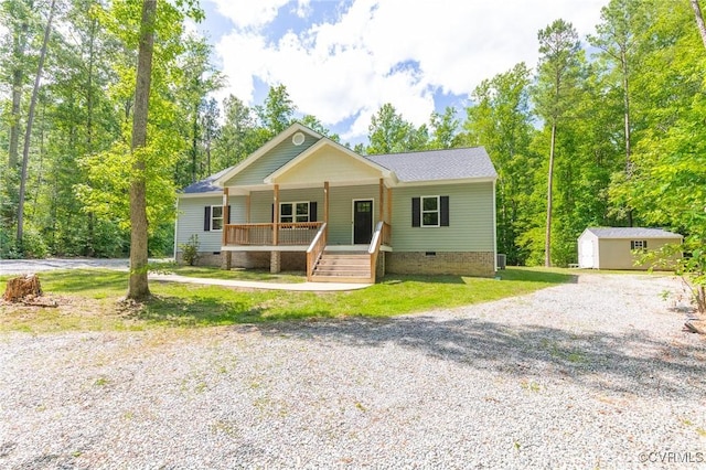 6180 Emmaus Church Rd, Providence Forge, VA 23140 - view of front facade featuring crawl space, a porch, driveway, a shingled roof, and a front lawn