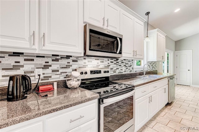 6180 Emmaus Church Rd, Providence Forge, VA 23140 - kitchen with stainless steel appliances, a sink, tasteful backsplash, white cabinets, and pendant lighting