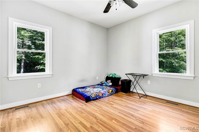 6180 Emmaus Church Rd, Providence Forge, VA 23140 - bedroom featuring multiple windows, wood finished floors, baseboards, and ceiling fan