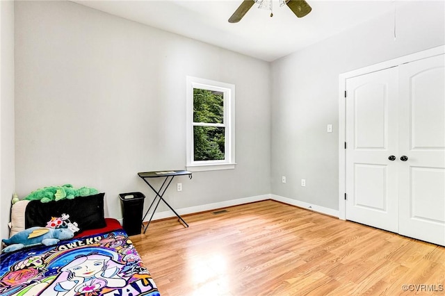 6180 Emmaus Church Rd, Providence Forge, VA 23140 - bedroom with light wood-type flooring, baseboards, a ceiling fan, and a closet