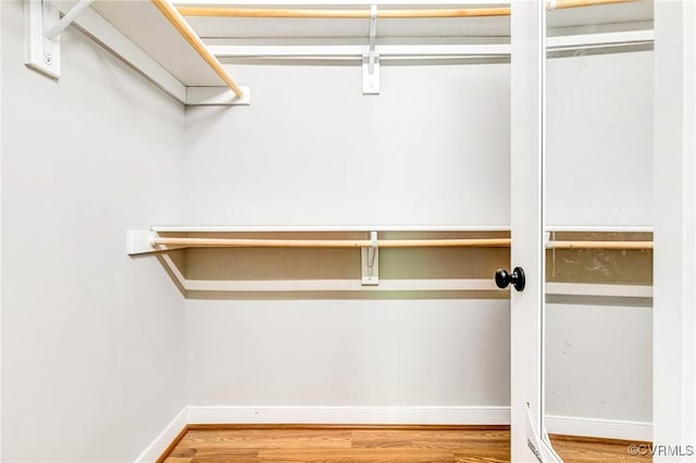 6180 Emmaus Church Rd, Providence Forge, VA 23140 - walk in closet featuring wood finished floors