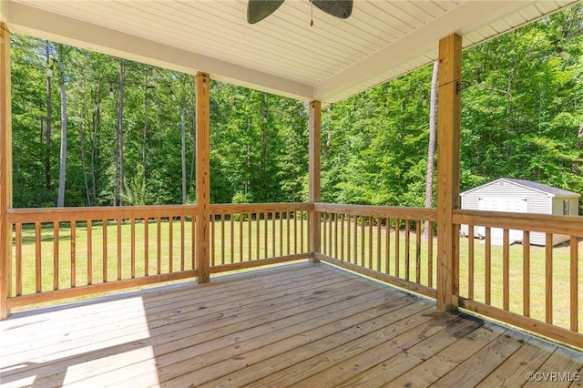 6180 Emmaus Church Rd, Providence Forge, VA 23140 - deck with a ceiling fan, a yard, and a wooded view