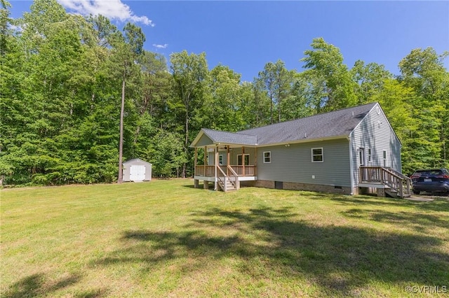 6180 Emmaus Church Rd, Providence Forge, VA 23140 - back of house with ceiling fan, a yard, crawl space, a deck, and a view of trees