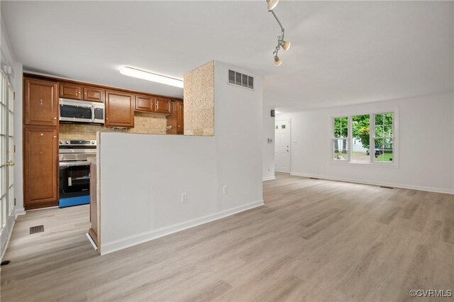 9901 Husting Ct, Chesterfield, VA 23832 - unfurnished living room with light wood finished floors and baseboards