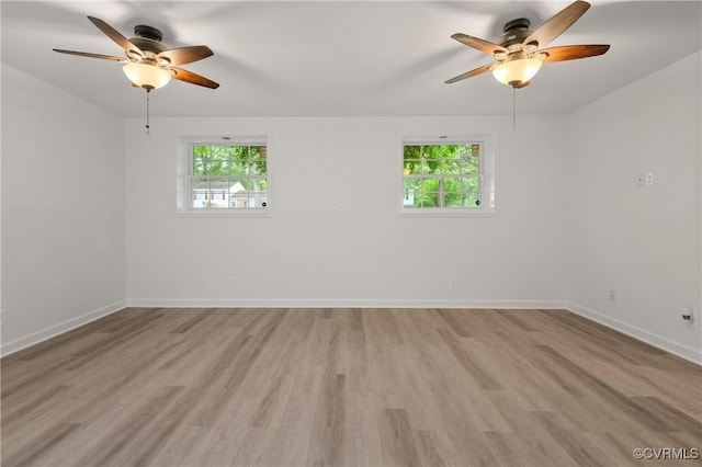 9901 Husting Ct, Chesterfield, VA 23832 - spare room with a ceiling fan, healthy amount of natural light, and light wood finished floors
