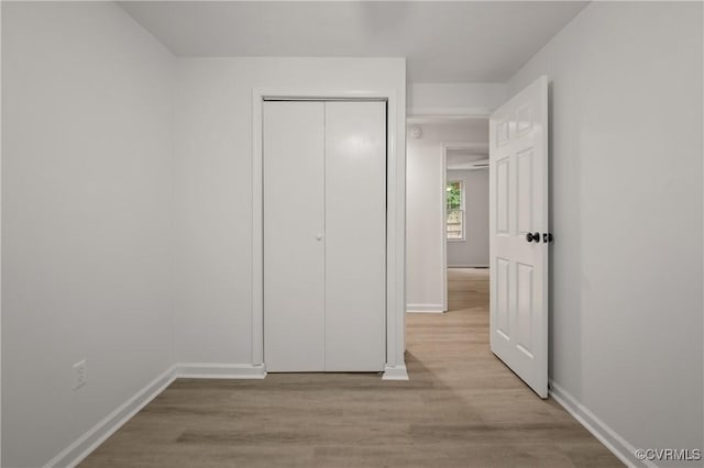 9901 Husting Ct, Chesterfield, VA 23832 - unfurnished bedroom featuring baseboards, wood finished floors, and a closet
